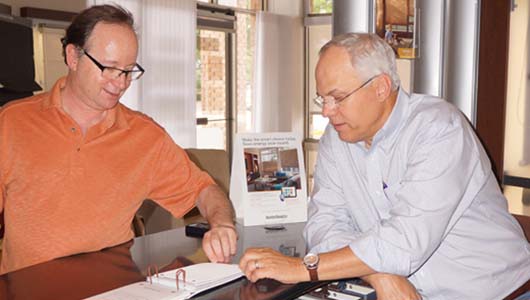 Owner Working With Customer